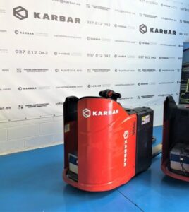 Transpaleta eléctrica LINDE T20SP de 2000 kg con plataforma para conductor ideal para carga y descarga en almacén